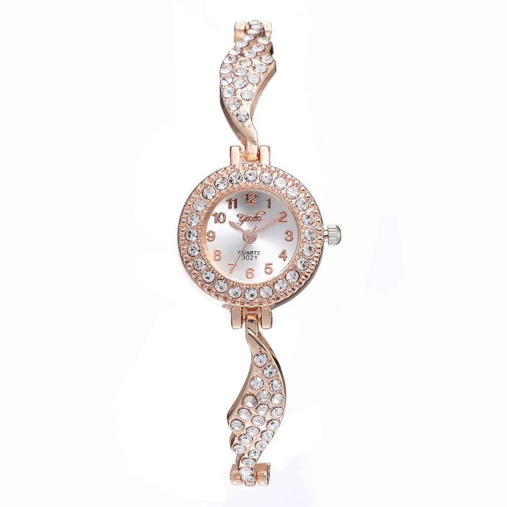 Wish new ladies alloy watch ladies fashion full diamond wing bracelet bracelet quartz watch on behalf of