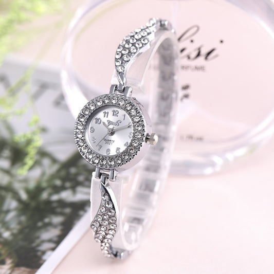 Wish new ladies alloy watch ladies fashion full diamond wing bracelet bracelet quartz watch on behalf of