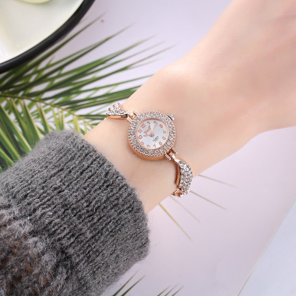 Wish new ladies alloy watch ladies fashion full diamond wing bracelet bracelet quartz watch on behalf of