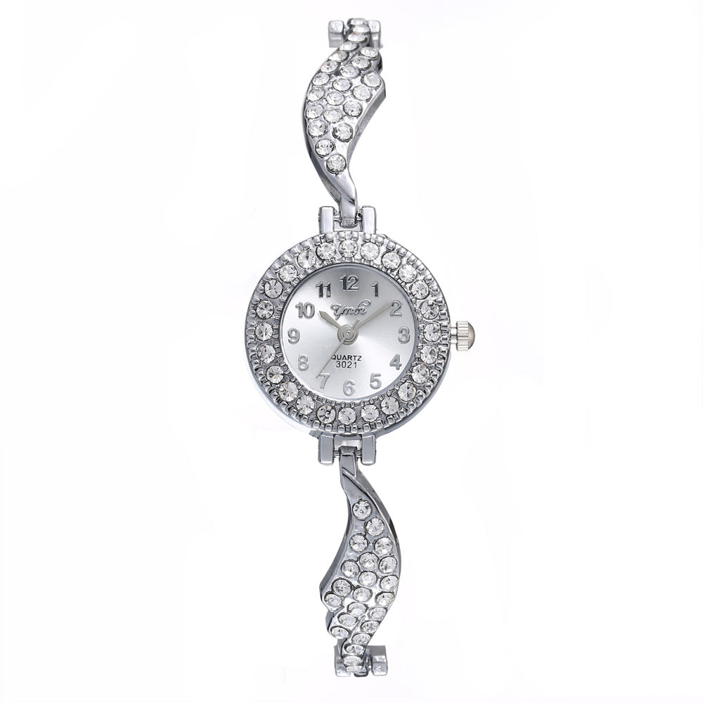 Wish new ladies alloy watch ladies fashion full diamond wing bracelet bracelet quartz watch on behalf of